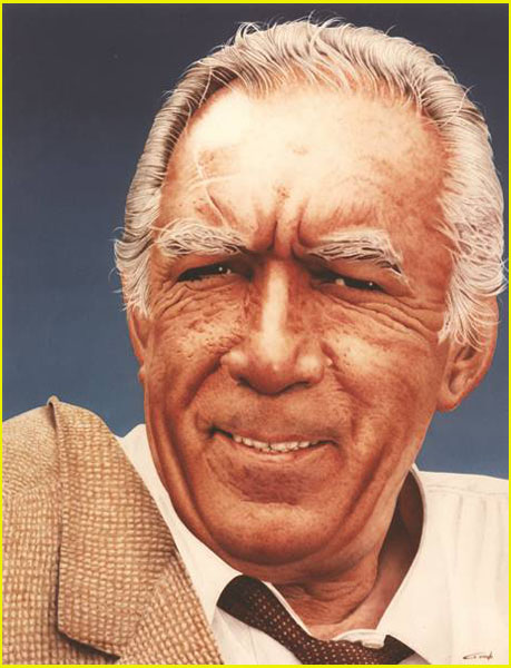 Portrait de face à l’aérographe d’Anthony Quinn en couleur sur un fond dégradé bleu